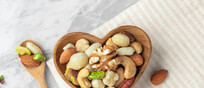 Noci e legumi per la salute del cuore . Attestazione: everydayplus - iStock